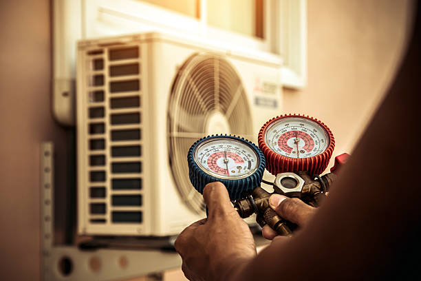 Professional Heat Pump Repair technician working in Mayfield, PA